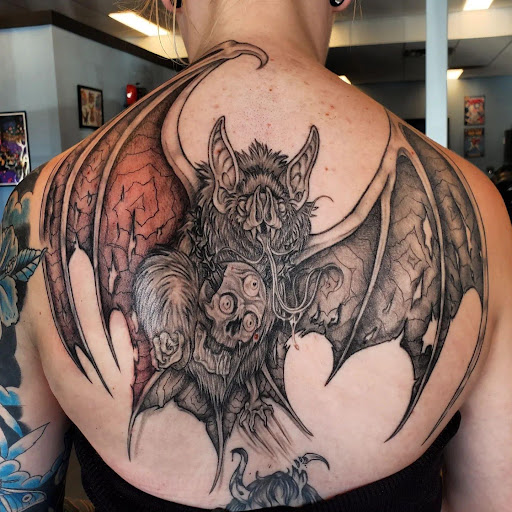 Explore wisconsin tattoo ideas, creative tattoo ideas in Palm Harbor, available at Angry Owl Tattoo and Piercing