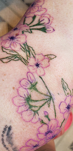 Explore tattoo ideas for side of stomach, creative tattoo ideas in Davis, available at SIX GUN SOUND TATTOO