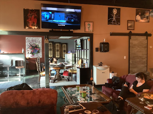 Find bird tattoo ideas for your next unique tattoo in Mason City at Soulless Tattoo Collective