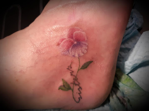 Explore back tattoo ideas for guys, creative tattoo ideas in Arcade, available at 98 South Tattoo and Piercing