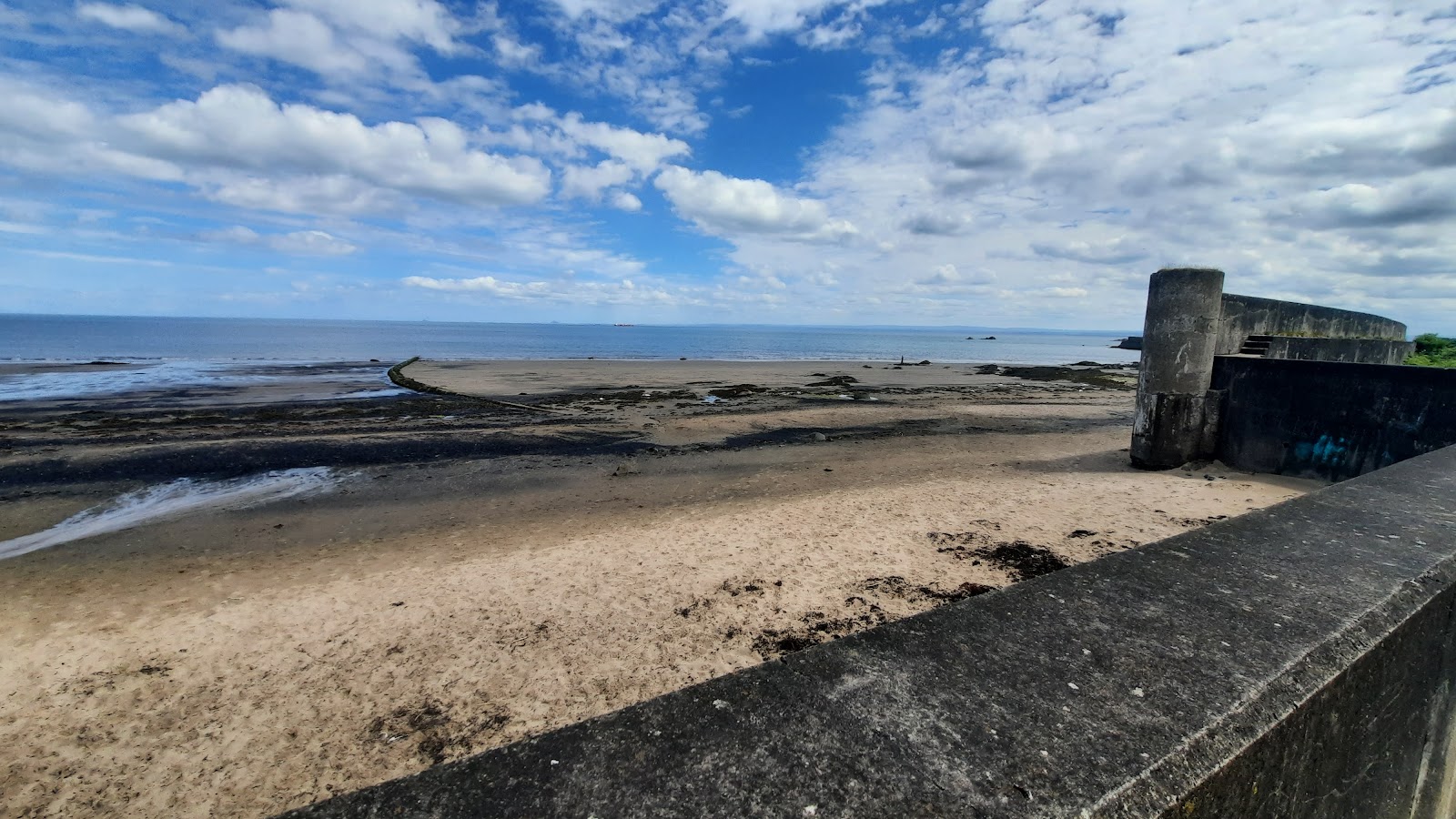 Photo of Seafield Beach and the settlement