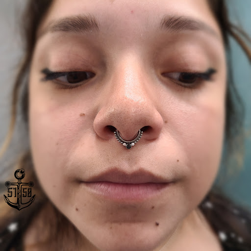 Find gothic punk tattoo ideas for your next unique tattoo in Kearney at Studio 5150 Piercing & Fine Jewelry