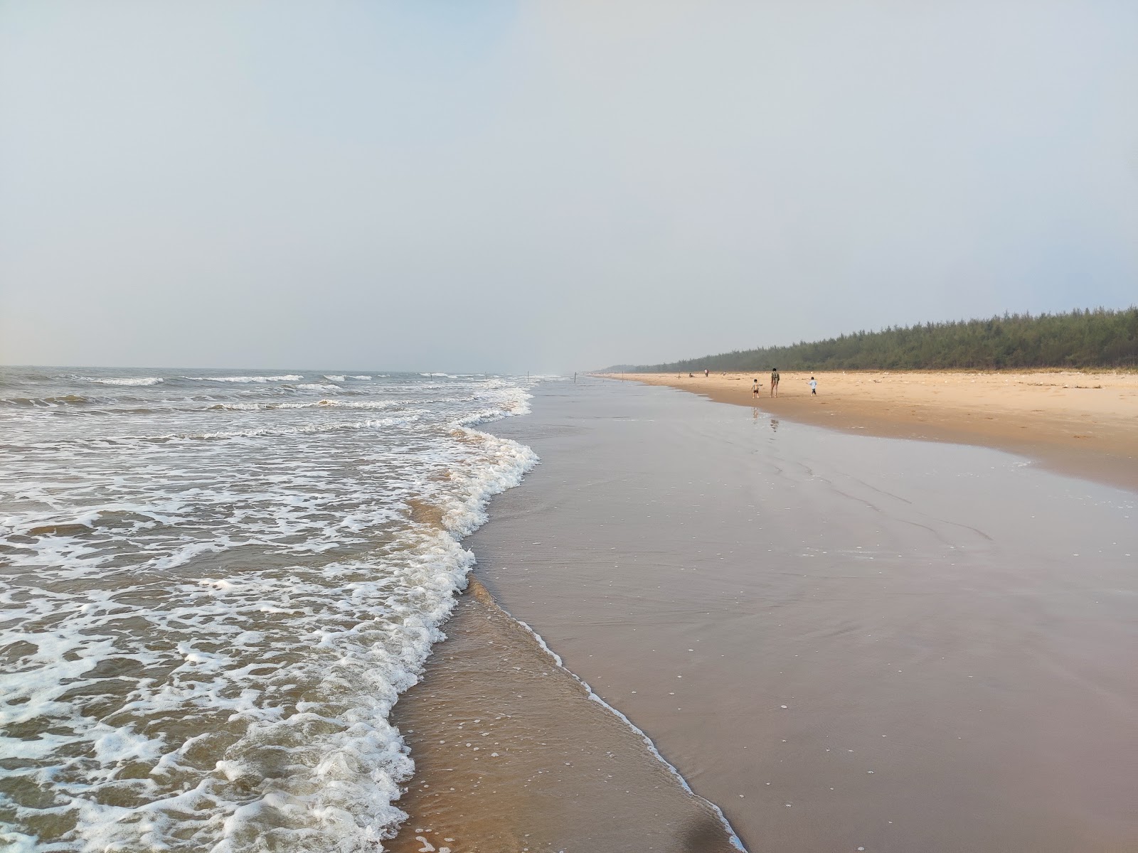 Valokuva Ramapuram Shootout Beachista. pinnalla kirkas hiekka:n kanssa