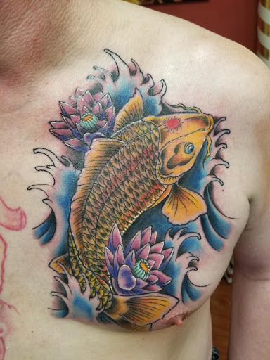 Explore batman logo tattoo ideas, creative tattoo ideas in Warren, available at Elite Ink Tattoo Studios