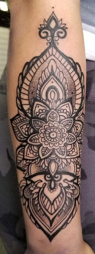 Explore ideas for rib tattoos, creative tattoo ideas in Waterloo, available at Friki Tiki Tattoo and Gallery