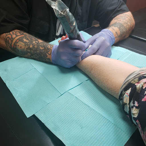 Explore tattoo ideas rose, creative tattoo ideas in Overland Park, available at Classic Tattoo and Body Piercing