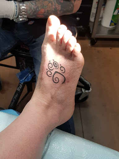 Explore ideas for ring tattoos, creative tattoo ideas in Green Bay, available at Tattoos By Rick Quality Custom Tattooing