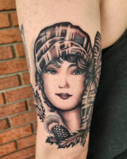 Explore pink ribbon tattoo ideas, creative tattoo ideas in Charles Town, available at Blue Heron Tattoo