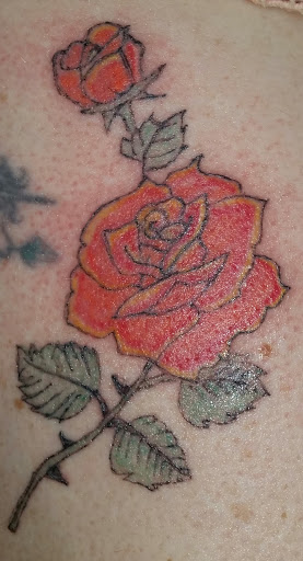 Explore cover up tattoo ideas for leg, creative tattoo ideas in Davis, available at SIX GUN SOUND TATTOO