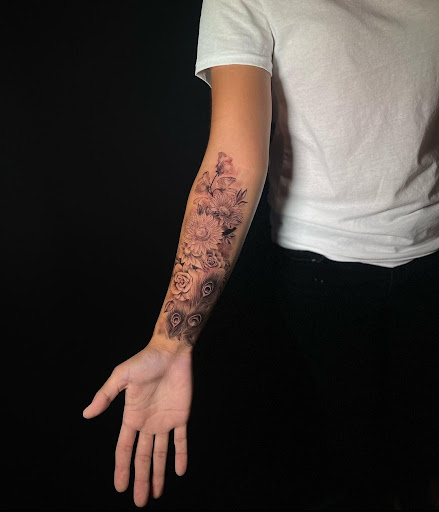 Explore lung cancer ribbon tattoo ideas, creative tattoo ideas in Venice, available at Ink Monkey Tattoo and Piercing