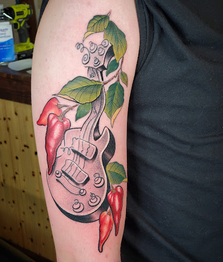 Explore wildflower tattoo ideas, creative tattoo ideas in Bellingham, available at Beluga Palooza Tattoo