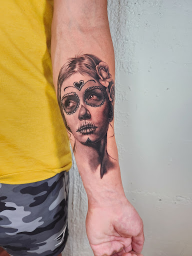 Explore candle tattoo ideas, creative tattoo ideas in Independence, available at Bare Skin Tattoo