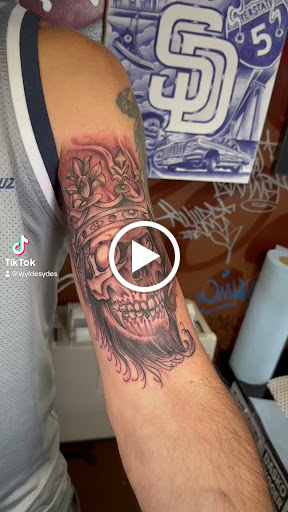 Explore back of the ear tattoo ideas, creative tattoo ideas in San Diego, available at Wylde Sydes Tattoo & Body Piercing