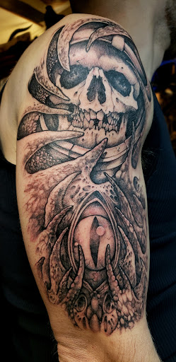 Explore tattoo sleeve filler ideas for a man, creative tattoo ideas in Fuquay Varina, available at 401 Tattoo and Antiquities