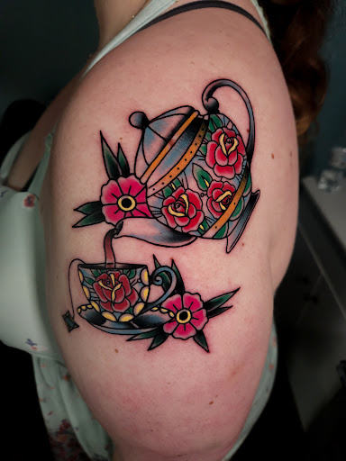 Explore small tattoo ideas for men arm, creative tattoo ideas in Calhoun, available at A Sailors Grave Tattoo Parlor