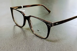 Netram Optic, eye glasses, contactlens, goggles, optical frame bluecut lens, essilor,Zeiss,crizal uv,best opticians Junagadh image