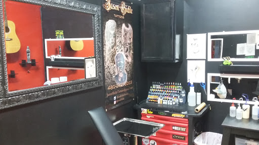 Explore black flower tattoo ideas, creative tattoo ideas in Glendale, available at Ritual Addictions Tattoo and Piercing
