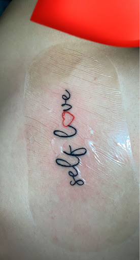 Explore afro tattoo ideas, creative tattoo ideas in Grandville, available at Wicked Ways Tattooing