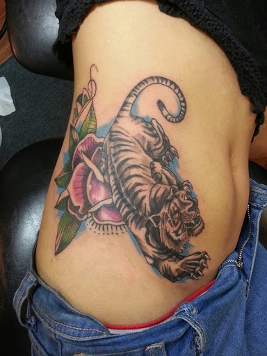 Explore side tattoo ideas for guys, creative tattoo ideas in Reading, available at Centre Avenue Tattoo