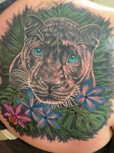 Explore ribbon tattoo ideas, creative tattoo ideas in Longview, available at Burning Rock Tattoo