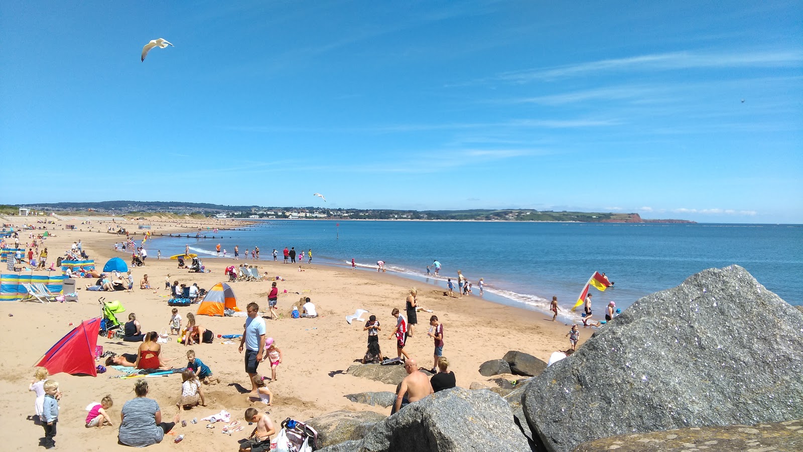 Foto di Dawlish Warren beach con una superficie del sabbia luminosa