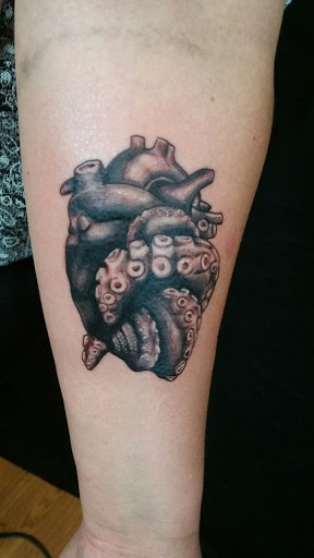 Explore forget me not tattoo ideas, creative tattoo ideas in Tucson, available at The Painted Lady Tattoo