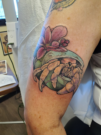 Explore dolly parton tattoo ideas, creative tattoo ideas in Peoria, available at Guerrilla Ink Tattoos