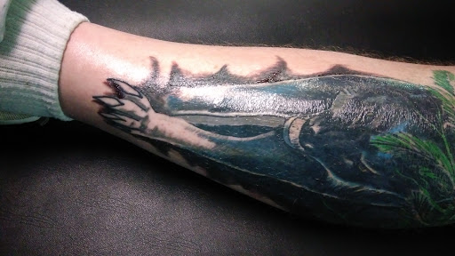 Explore cartoon tattoo ideas for men, creative tattoo ideas in Lufkin, available at Irish Custom Tattoos