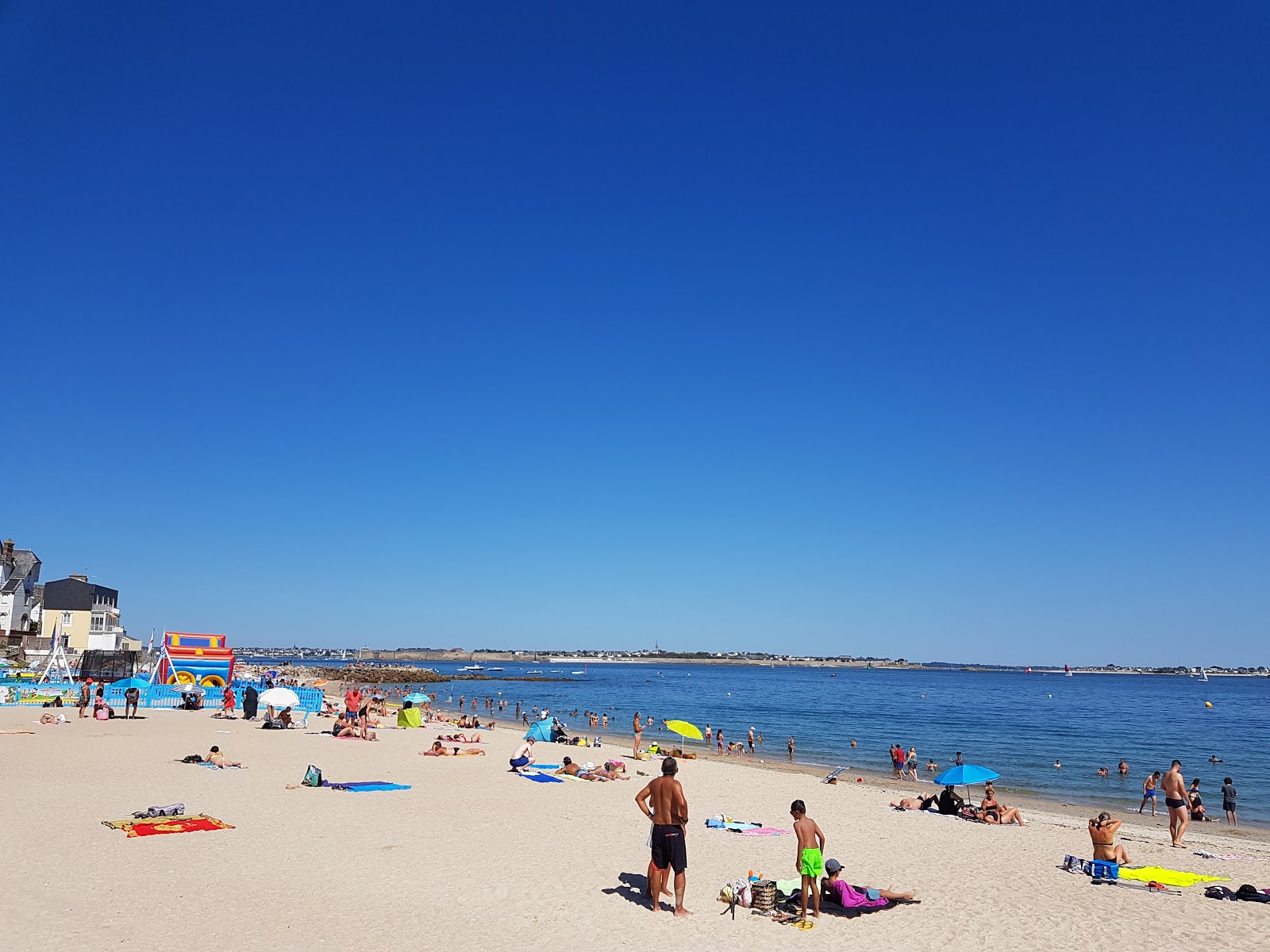 Fotografija Plage de Port Maria z svetel pesek površino