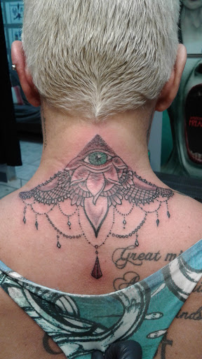 Find cardinal tattoo ideas for ladies for your next unique tattoo in Bradenton at Memory Lane Tattoo Co.