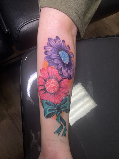 Explore upper back tattoo ideas male, creative tattoo ideas in Superior, available at Northlandia tattoo parlor