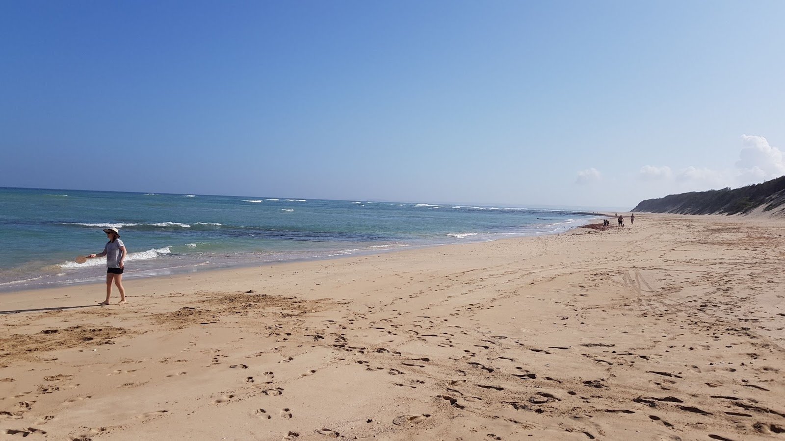Foto von Old Jetty beach mit feiner beiger sand Oberfläche