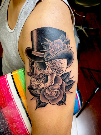 Explore wrap around tattoo ideas, creative tattoo ideas in Modesto, available at Inkwell Tattoo