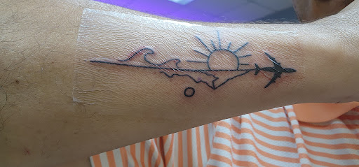 Explore couple ring finger tattoo ideas, creative tattoo ideas in Fort Myers, available at Loyal 2 The Coil Tattoos & Piercings (Edison Mall Location Entrance F)