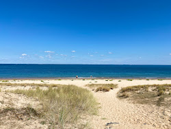 Plage de la Grande Conche'in fotoğrafı - rahatlamayı sevenler arasında popüler bir yer