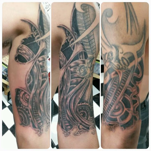 Explore 2 percent tattoo ideas, creative tattoo ideas in Tucson, available at Tattoo Azteca Inc