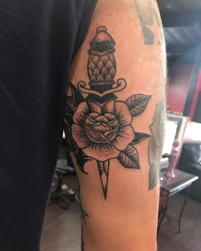 Explore tattoo name ideas for men, creative tattoo ideas in Rowlett, available at Fresh Image Tattoo Studios