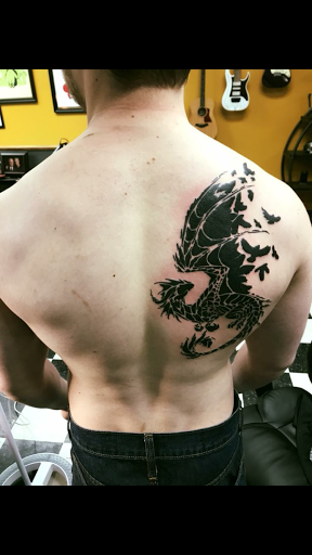 Explore side boob tattoo ideas, creative tattoo ideas in Stevens Point, available at Black Rabbit Tattooing