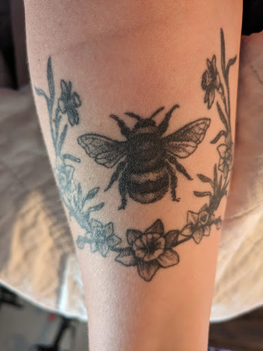 Explore feminine arm tattoo ideas, creative tattoo ideas in Fort Myers, available at HOWL Tattoo & Piercing