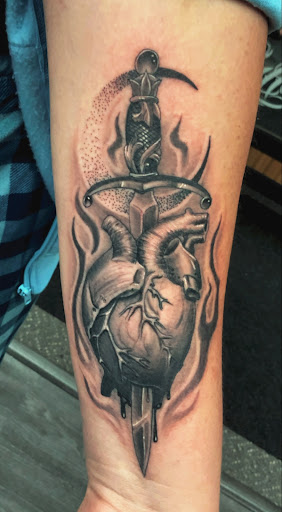 Explore music tattoo ideas men, creative tattoo ideas in Sanford, available at Addictive Ink Tattoo Studio