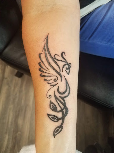 Explore behind the ear tattoo ideas, creative tattoo ideas in Athens, available at United Ink Tattoos and Body Piercings