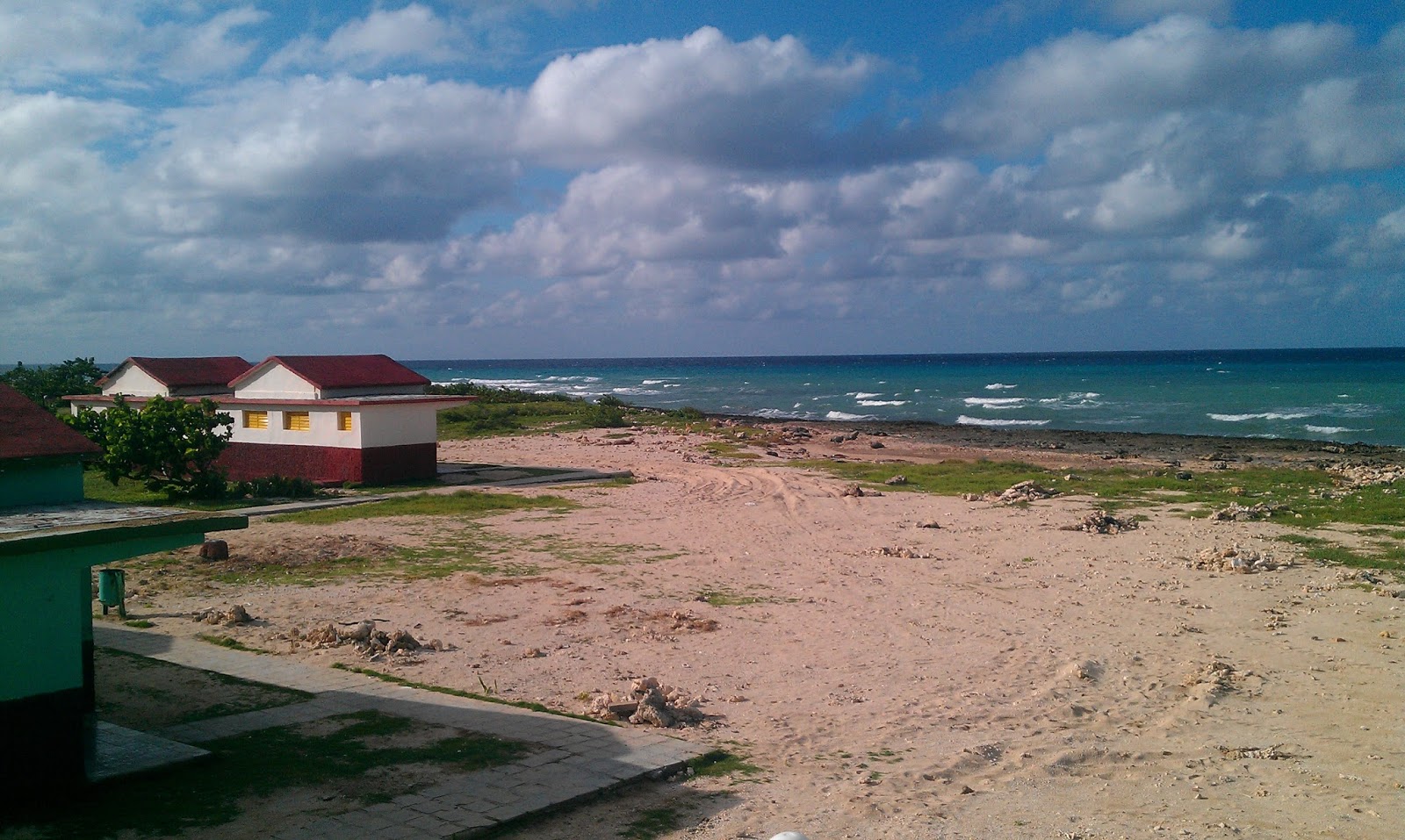 Foto di Playa Corella con una superficie del sabbia beige
