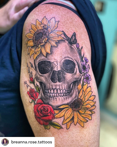 Explore cute spine tattoo ideas, creative tattoo ideas in Ocala, available at The Tattoo Gallery of Ocala LLC