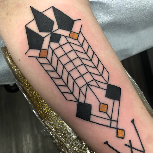 Explore hood tattoo ideas, creative tattoo ideas in Buffalo, available at True Gloom Tattoo Studio