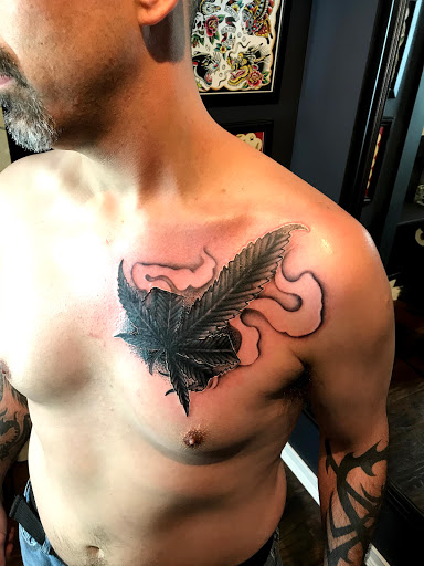 Explore cherubim tattoo ideas, creative tattoo ideas in Kingsford, available at Deft Tattoo Studio