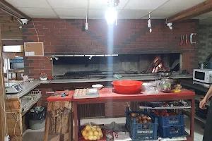 MUHTARIN YERİ RESTORAN (KÖFTE,IZGARA ÇEŞİTLERİ,KUYU TANDIR,SULU YEMEK) image