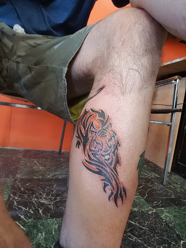 Explore carnation tattoo ideas, creative tattoo ideas in Caldwell, available at Craigs Tattoo Co