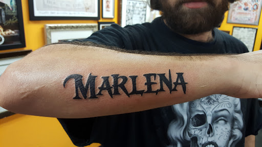 Explore paw print tattoo ideas, creative tattoo ideas in Stockton, available at THE PIRATES LOUNGE TATTOO PARLOR