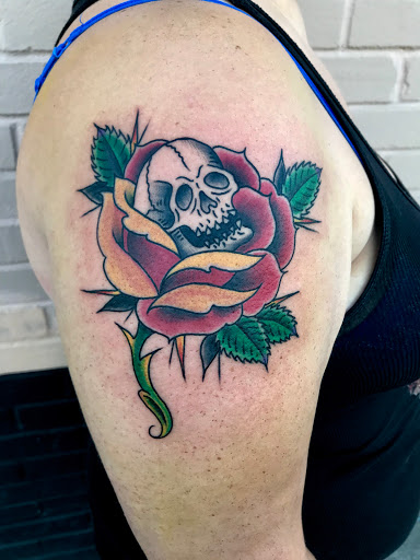 Explore daisy flower tattoo ideas, creative tattoo ideas in Modesto, available at Inkwell Tattoo