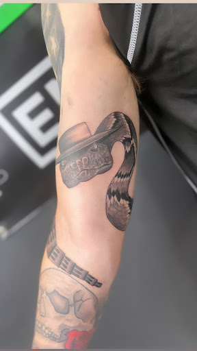 Explore mens small tattoo ideas, creative tattoo ideas in Cadillac, available at Limitless Ink Tattoo Studio